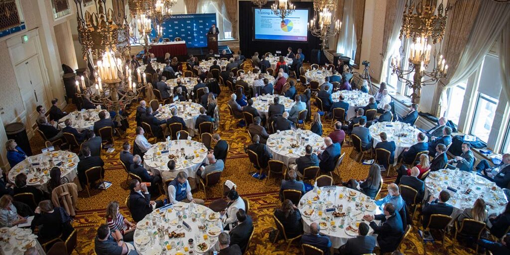 a large ballroom with a presentation