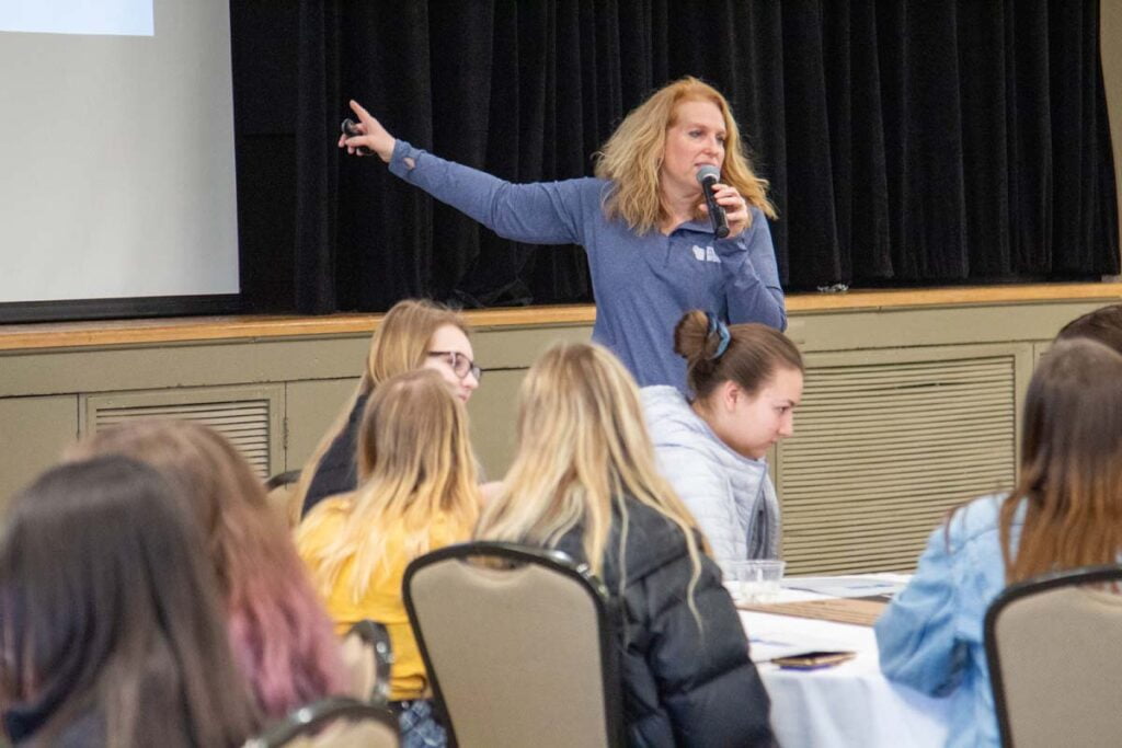 Michelle Grajkowski giving a presentation at Business world