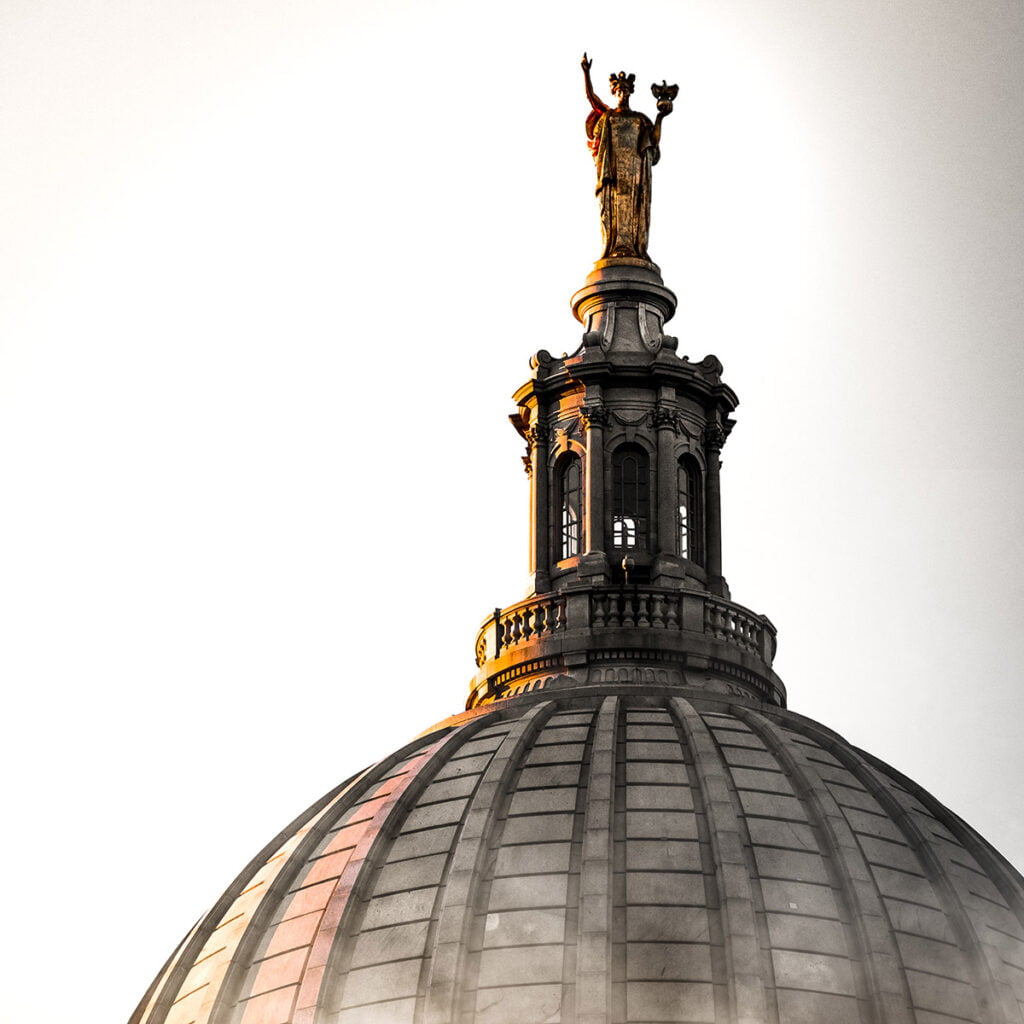 Statue at the top of Wisconsin State Capitol building